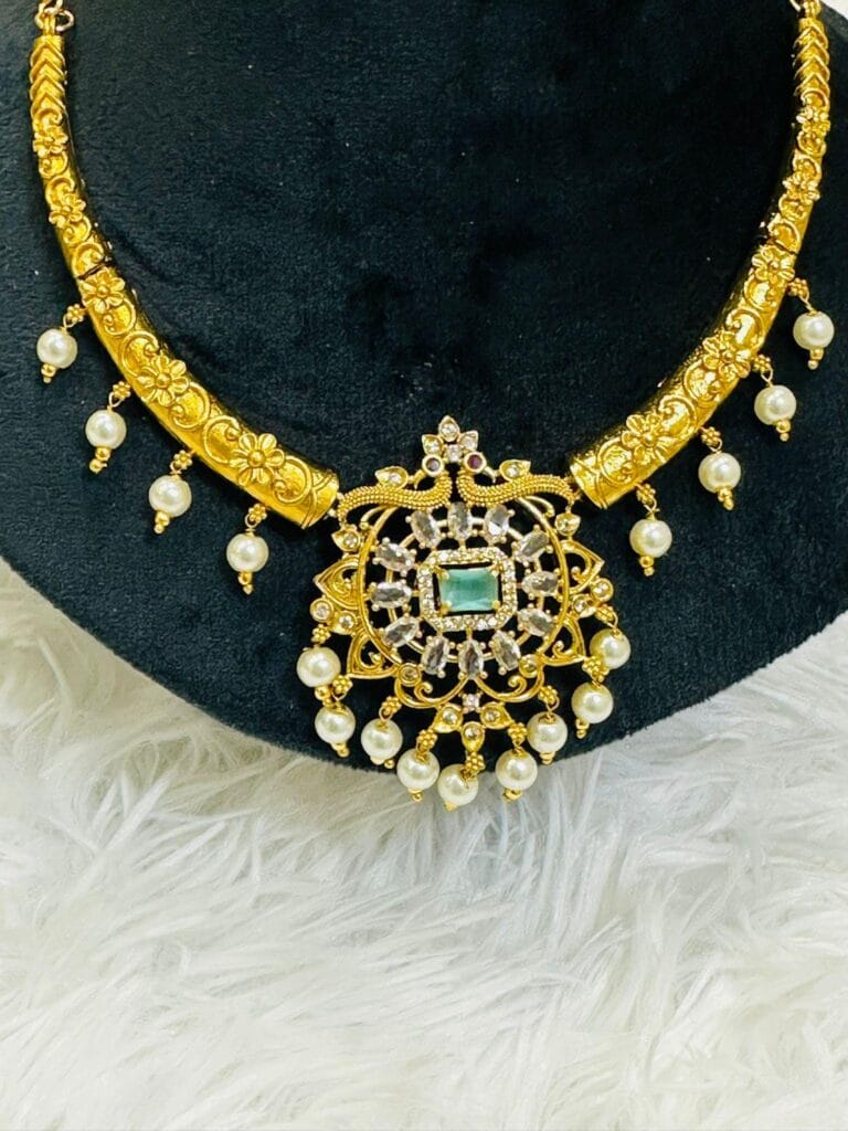 Traditional Kanti Necklace Set with Pearls & Green Stone Pendant | Bridal Gold Plated Choker Set