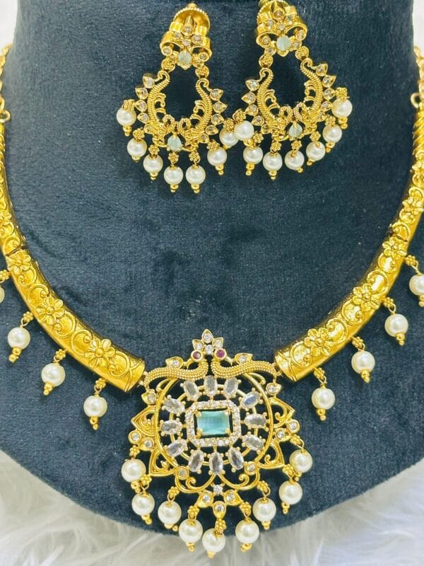 Traditional Kanti Necklace Set with Pearls & Green Stone Pendant | Bridal Gold Plated Choker Set